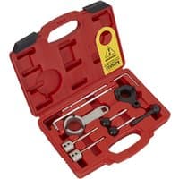 Red Sealey diesel engine timing tool kit with various metal tools in a molded case.