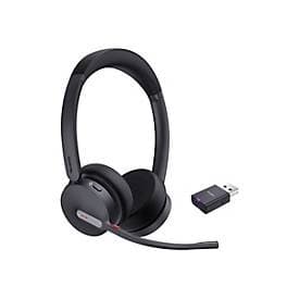 Black Yealink WH64 Hybrid Dual Teams headset with a sleek headband, soft ear cushions, and a flexible microphone boom, accompanied by a Micro-USB Bluetooth adapter.